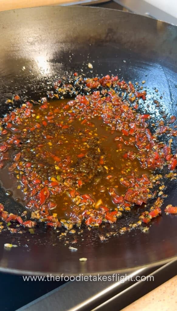 Spicy garlic sauce in a wok