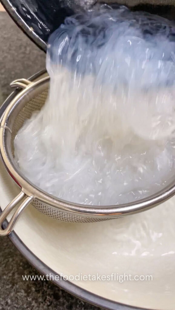 Draining vermicelli noodles from water
