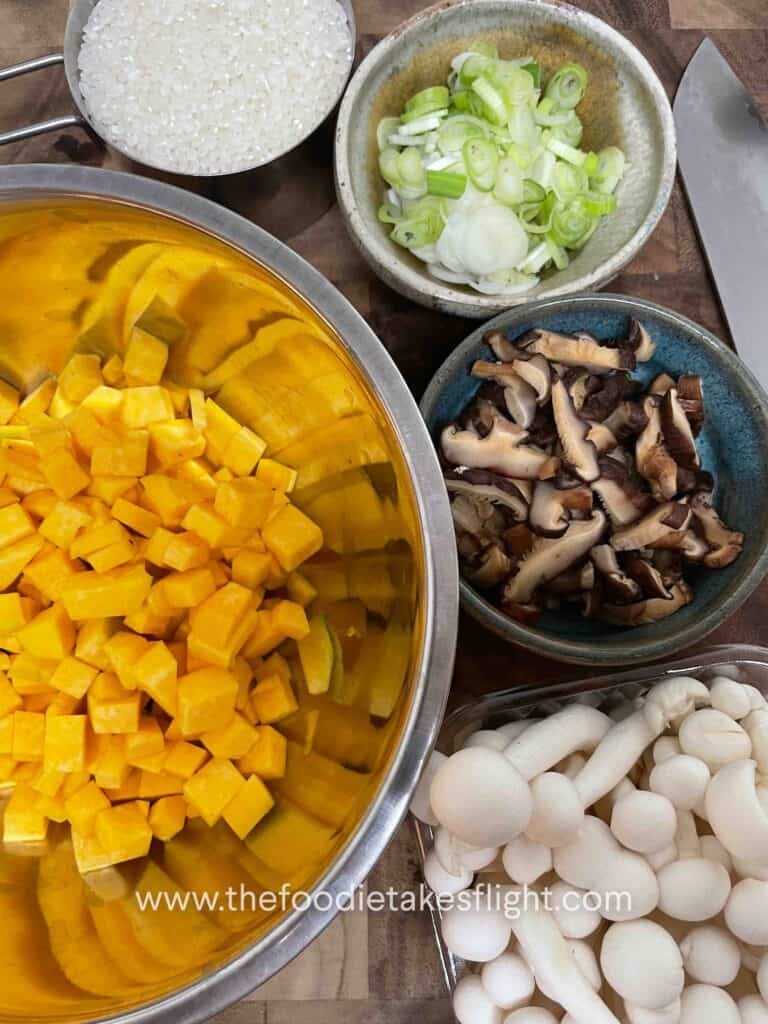 flat lay of diced pumpkin, shimeji, shiitake mushrooms, and green onions