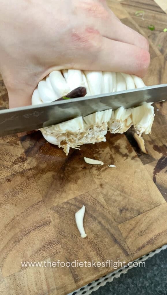 cutting trims off white shimeji mushrooms