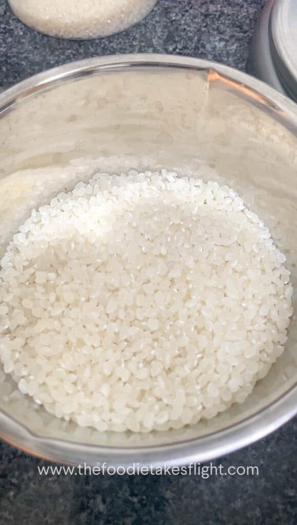 uncooked Japanese short grain rice in a bowl