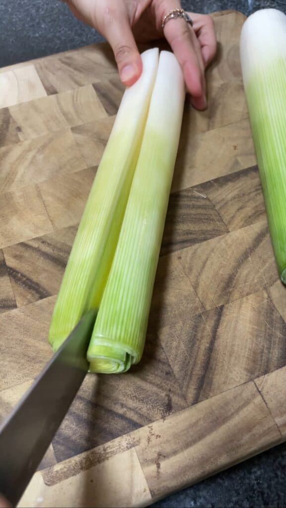 slicing leeks in half
