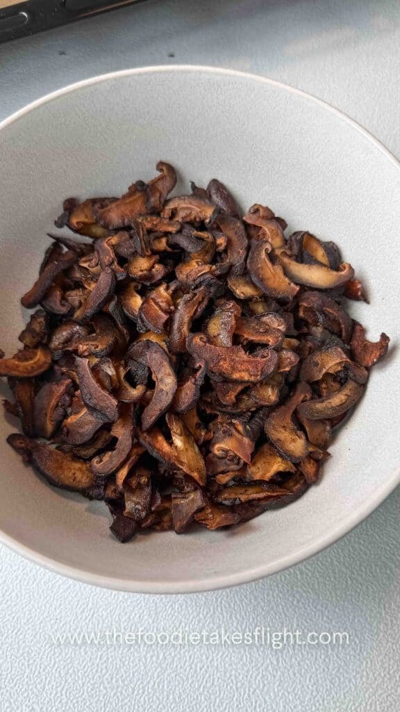 shiitake mushroom bacon in a white bowl