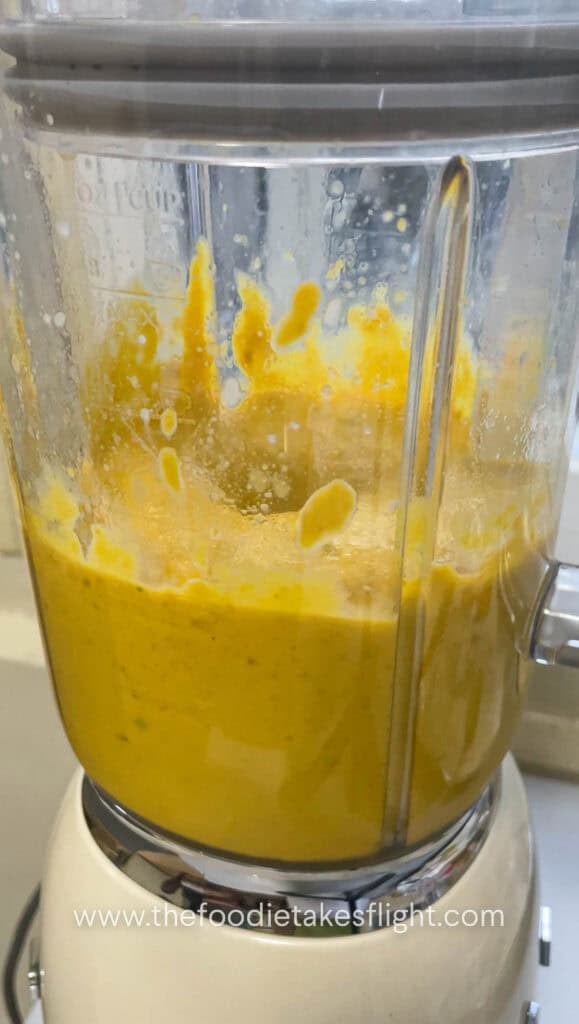 Blended pumpkin miso sauce in a blender