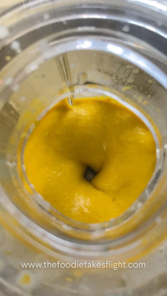 Blended pumpkin miso sauce in a blender