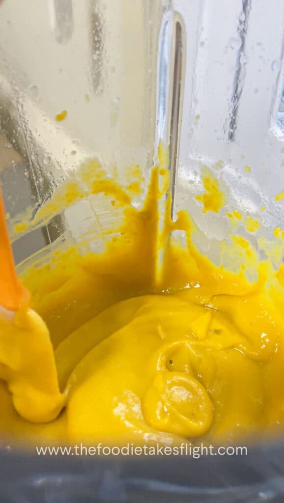 Blended pumpkin miso sauce in a blender