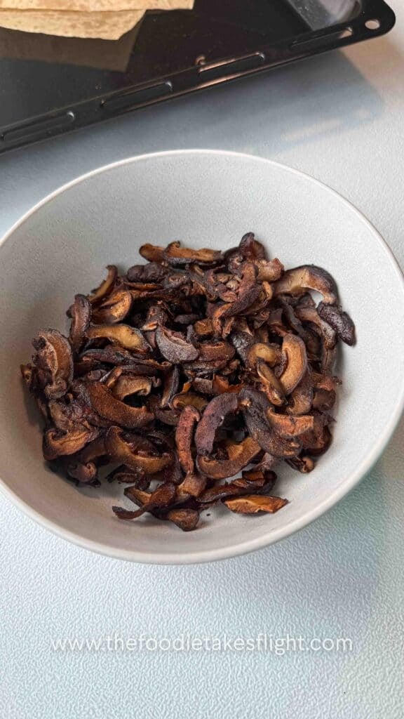 shiitake mushroom bacon in a white bowl