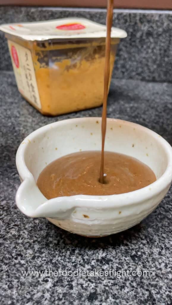 black garlic miso sauce in a small bowl