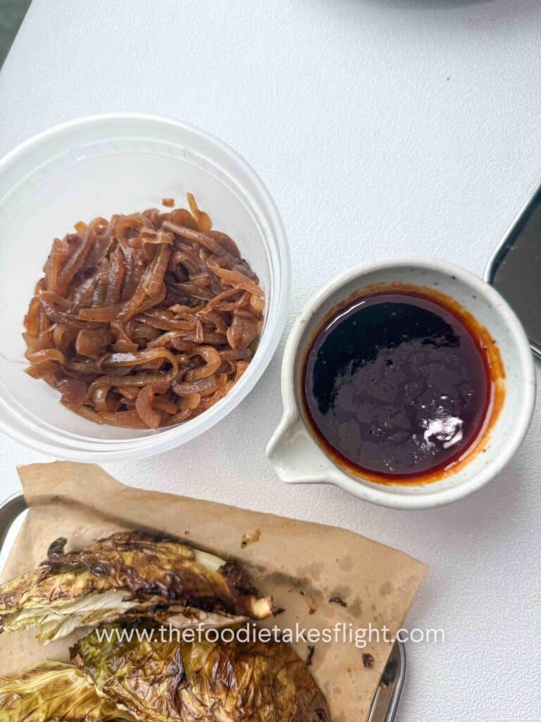 caramelised onions and gochujang butter sauce in a bowl