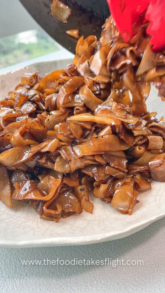 Soy-coated rice noodles lightly charred