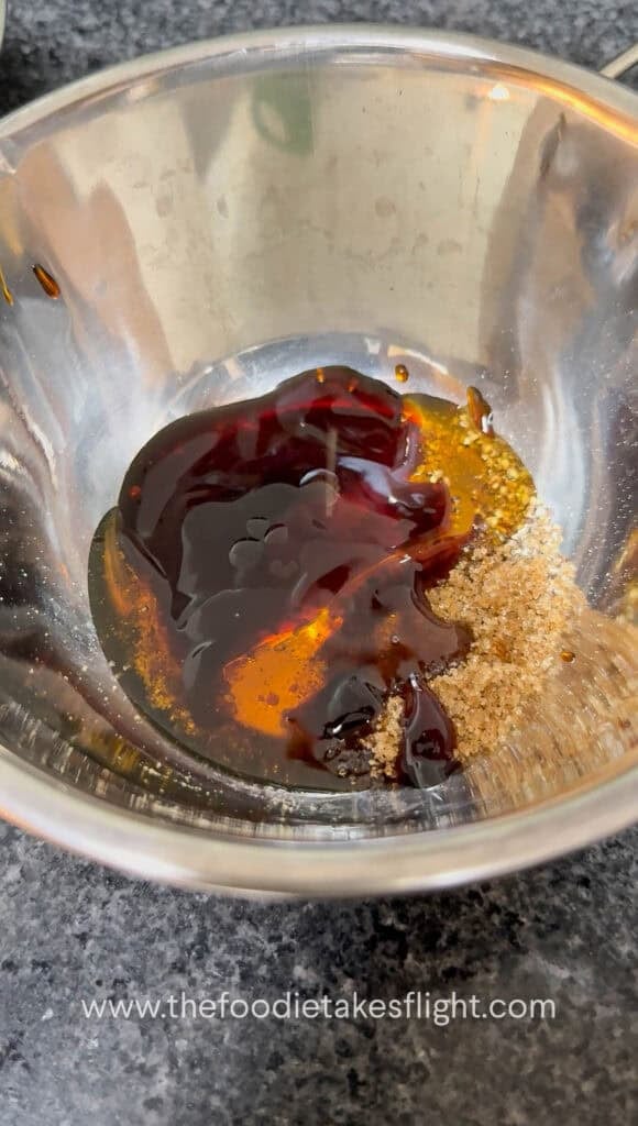 mixing together the gravy ingredients in a bowl