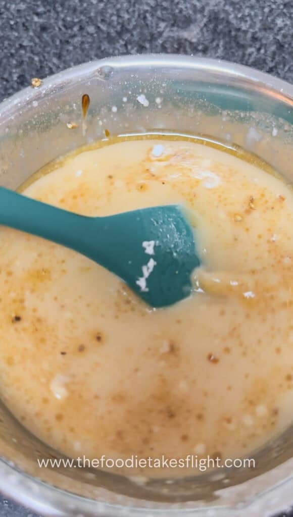 mixing together the gravy ingredients in a bowl