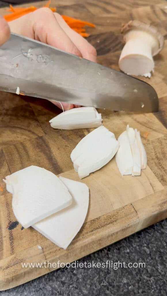slicing king oyster mushrooms