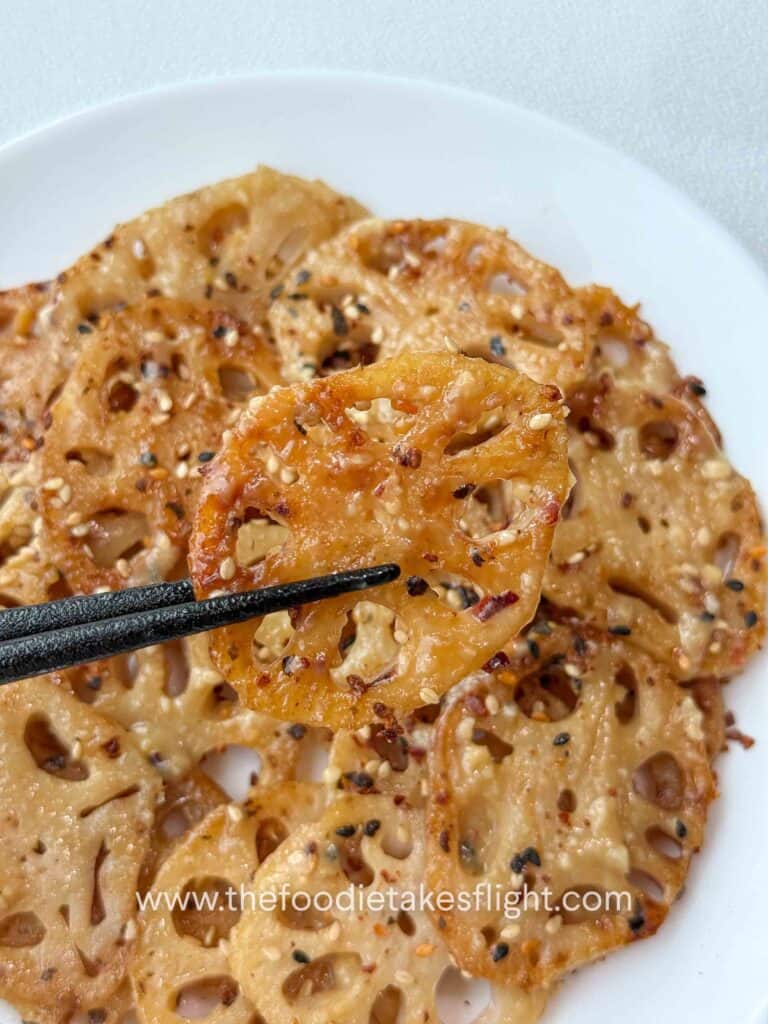 Pan-fried lotus root slices coated in lemon miso sauce