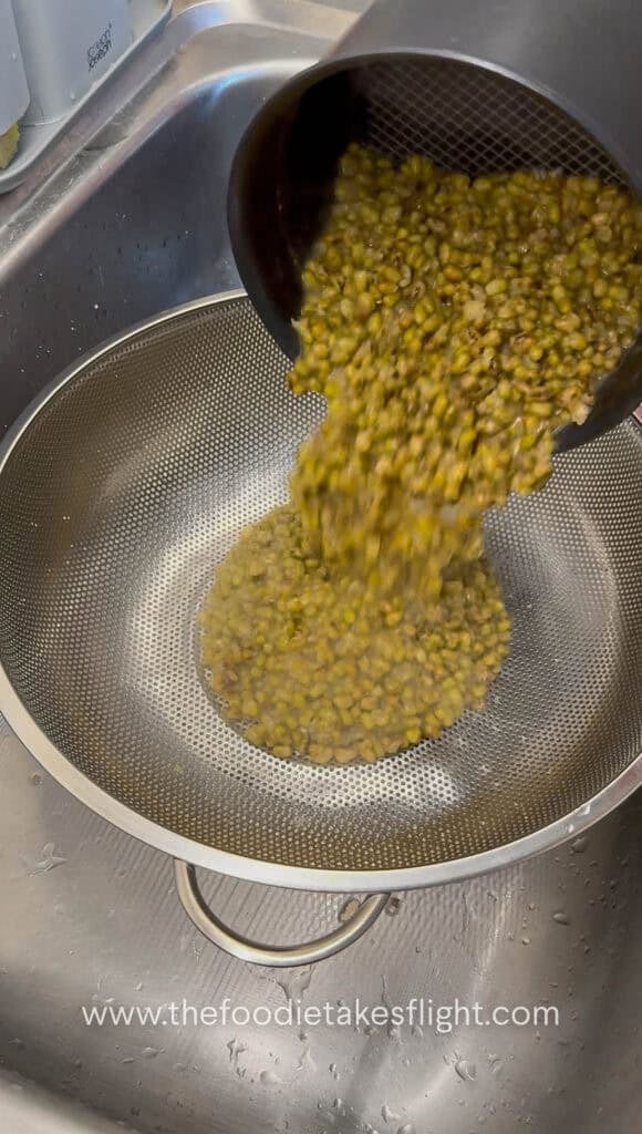 draining cooked mung beans