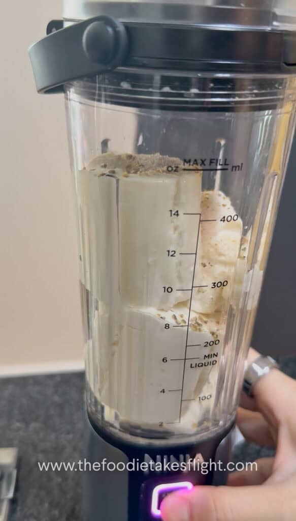 Silken tofu being blended into a smooth creamy sauce