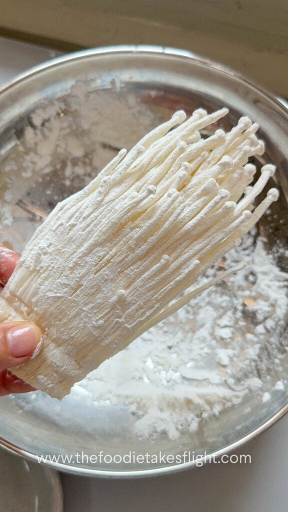 enoki mushrooms coated in corn starch