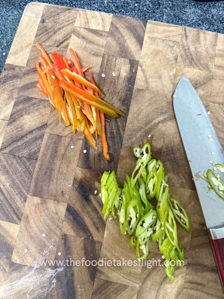 sliced red bell pepper and green chili