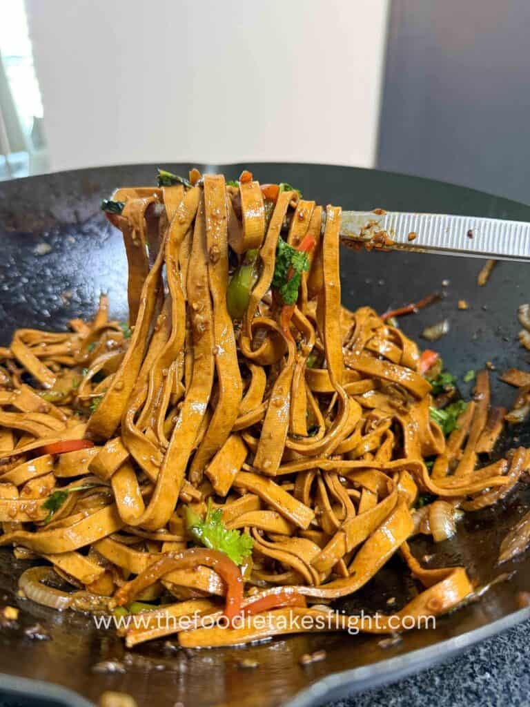 chewy tofu skin noodles stir-fried in a savory sauce