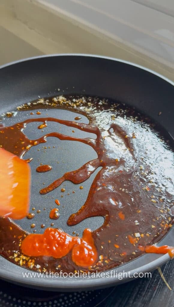 hoisin sriracha sauce in a pan