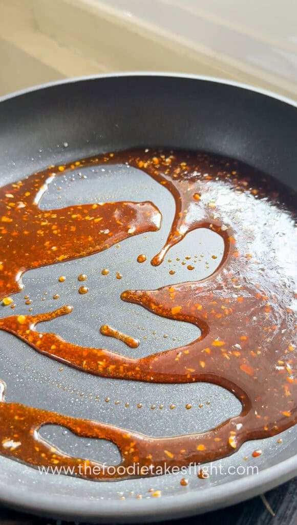 hoisin sriracha sauce in a pan