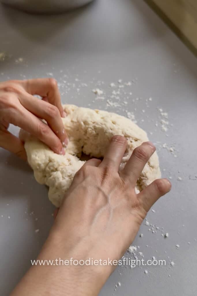 Pita dough divided into small balls before rolling into flatbreads