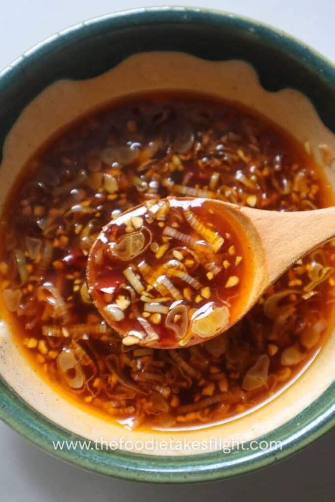 Sweet and spicy tofu sauce mixed with garlic, soy sauce, vegetarian oyster sauce, sugar, rice vinegar, and chili oil