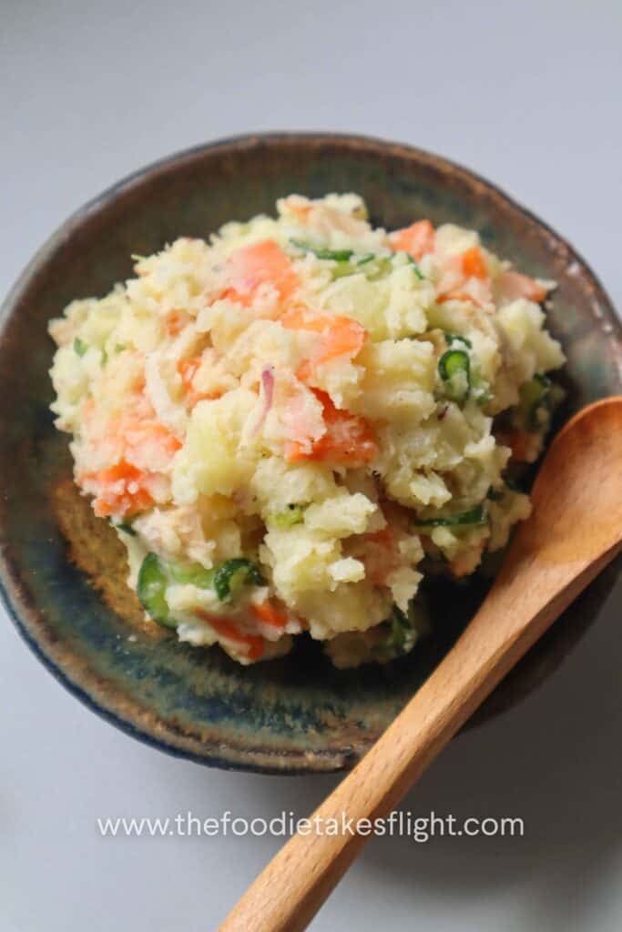 Japanese potato salad with cucumber, carrot, vegan ham, scallions, and roasted sesame dressing