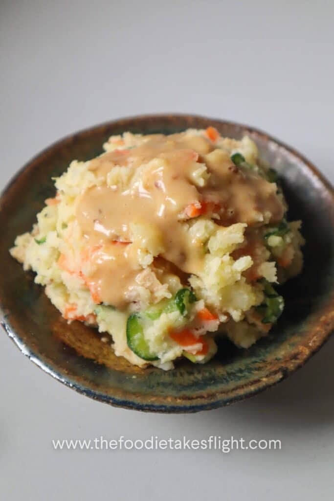 Japanese potato salad with cucumber, carrot, vegan ham, scallions, and roasted sesame dressing