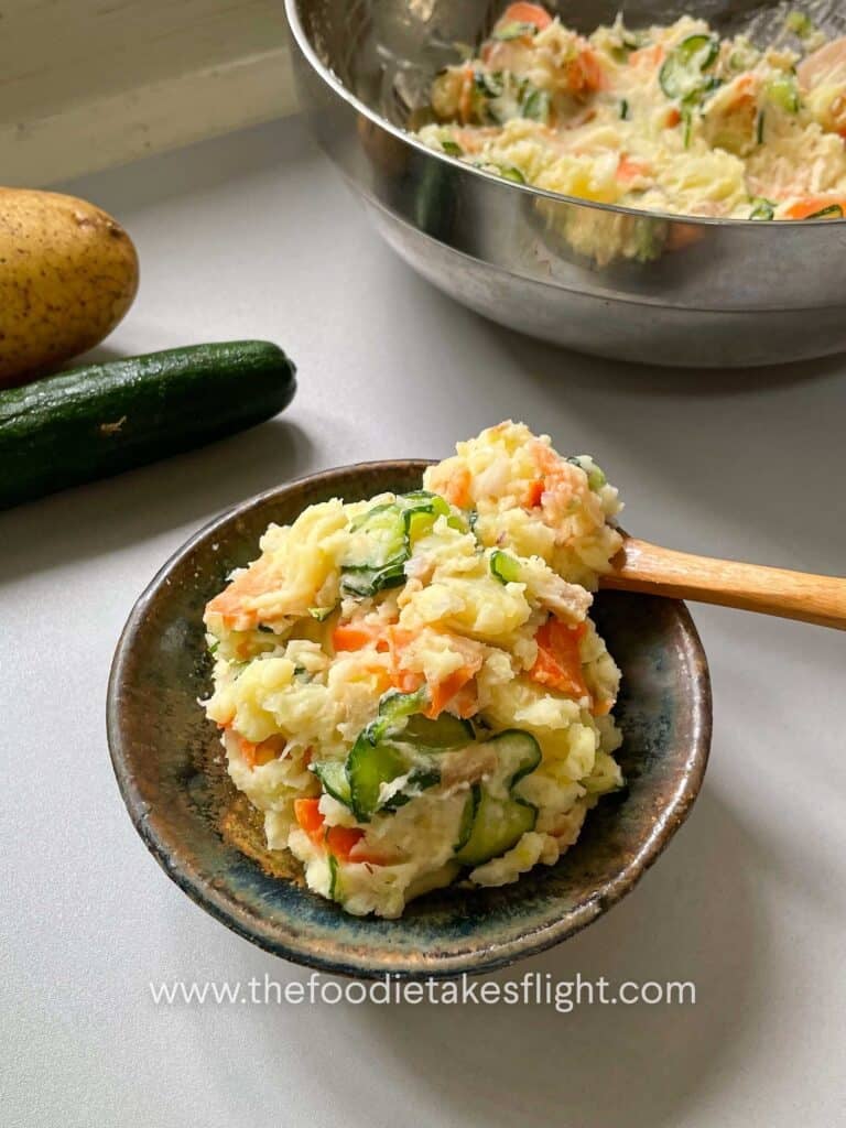 Japanese potato salad with cucumber, carrot, vegan ham, scallions, and roasted sesame dressing