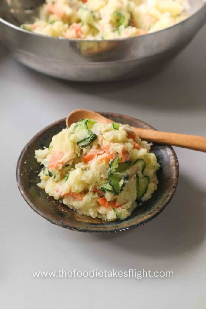 Japanese potato salad with cucumber, carrot, vegan ham, scallions, and roasted sesame dressing