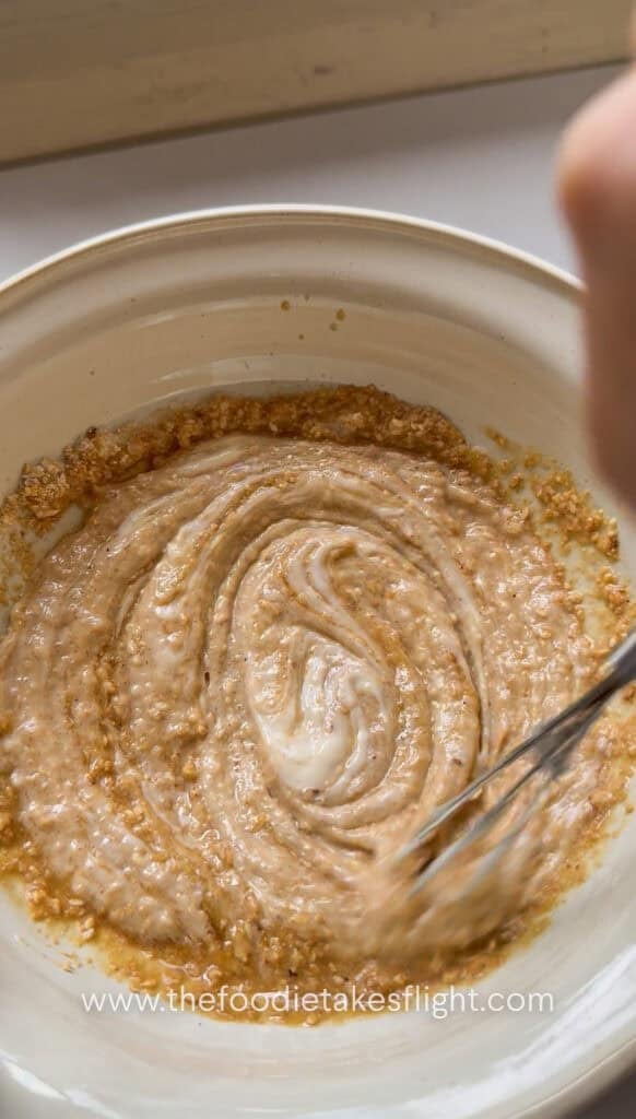 Egg-free Kewpie mayo, rice vinegar, soy sauce, sugar, water, and sesame oil mixed in a bowl