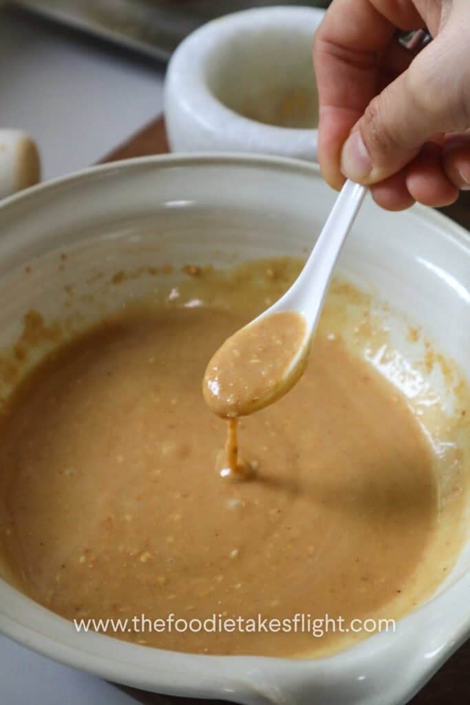Japanese roasted sesame dressing mixed until creamy with sesame bits throughout