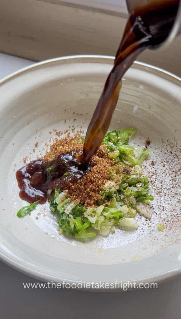 Soy sauce, Chinese black vinegar, brown sugar, chili oil, vegetarian oyster sauce, and Chinese five spice mixed for the sauce