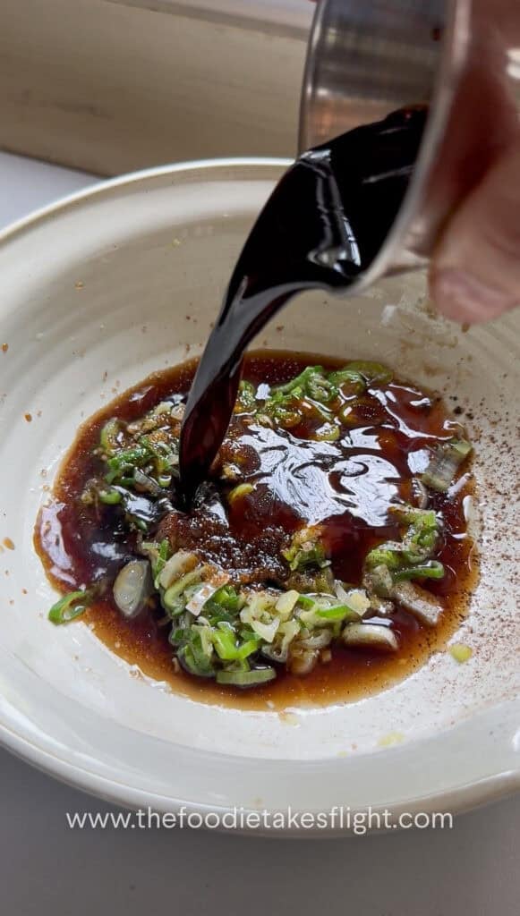 Soy sauce, Chinese black vinegar, brown sugar, chili oil, vegetarian oyster sauce, and Chinese five spice mixed for the sauce
