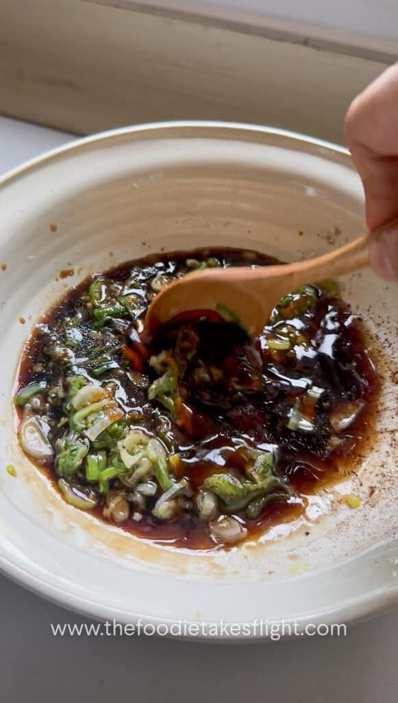 Soy sauce, Chinese black vinegar, brown sugar, chili oil, vegetarian oyster sauce, and Chinese five spice mixed for the sauce