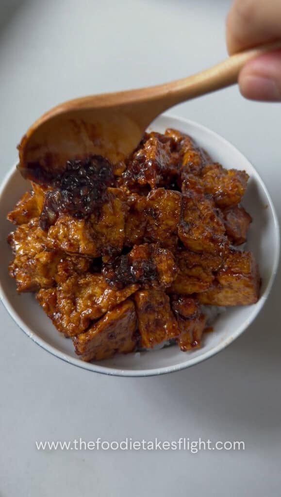sticky tofu rice bowl recipe with crispy hand-torn tofu in glossy hoisin sauce over steamed rice