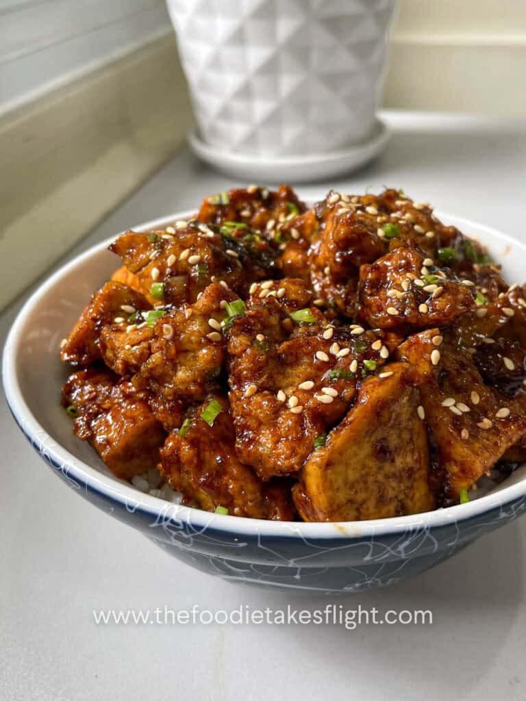 sticky tofu rice bowl recipe with crispy hand-torn tofu in glossy hoisin sauce over steamed rice