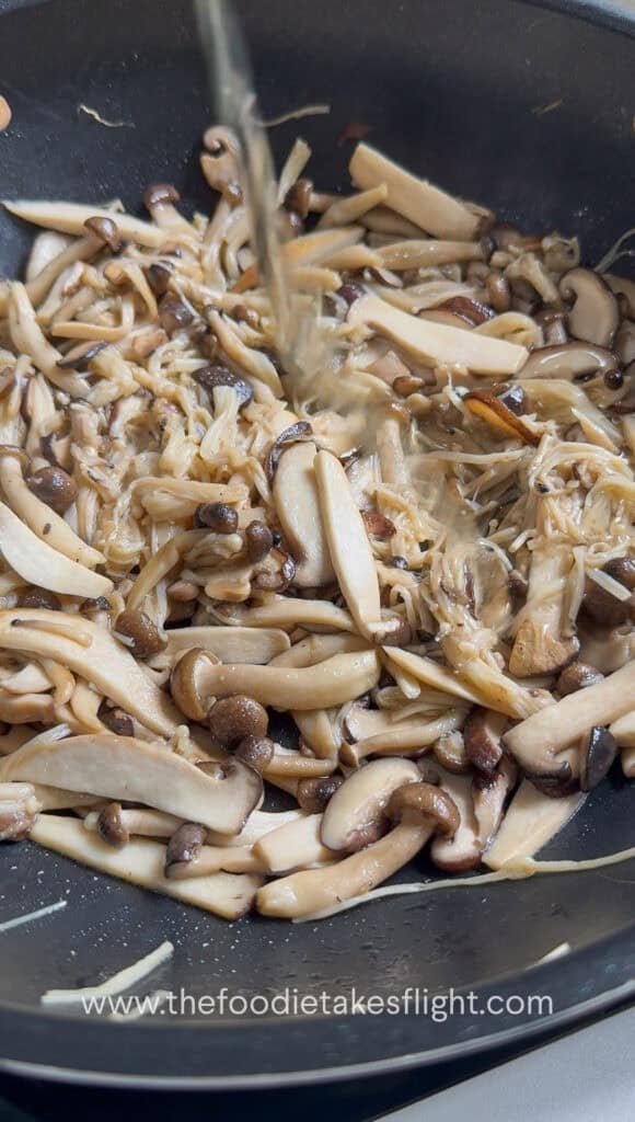 Oil and salt added to mushrooms after they release moisture