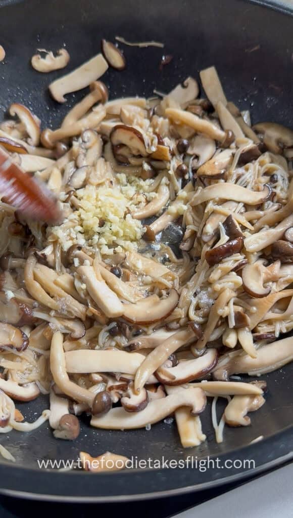 Sake, mirin, white miso paste, and soy sauce mixed for the mushroom seasoning