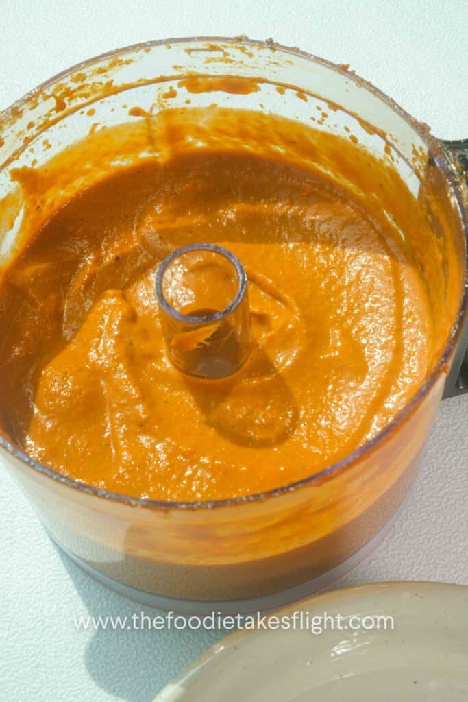 blended roasted red pepper dip in a food processor