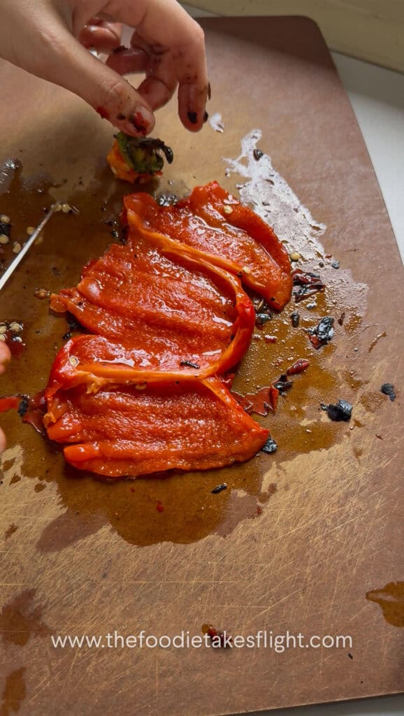 Seeds and charred bits removed from roasted red bell peppers
